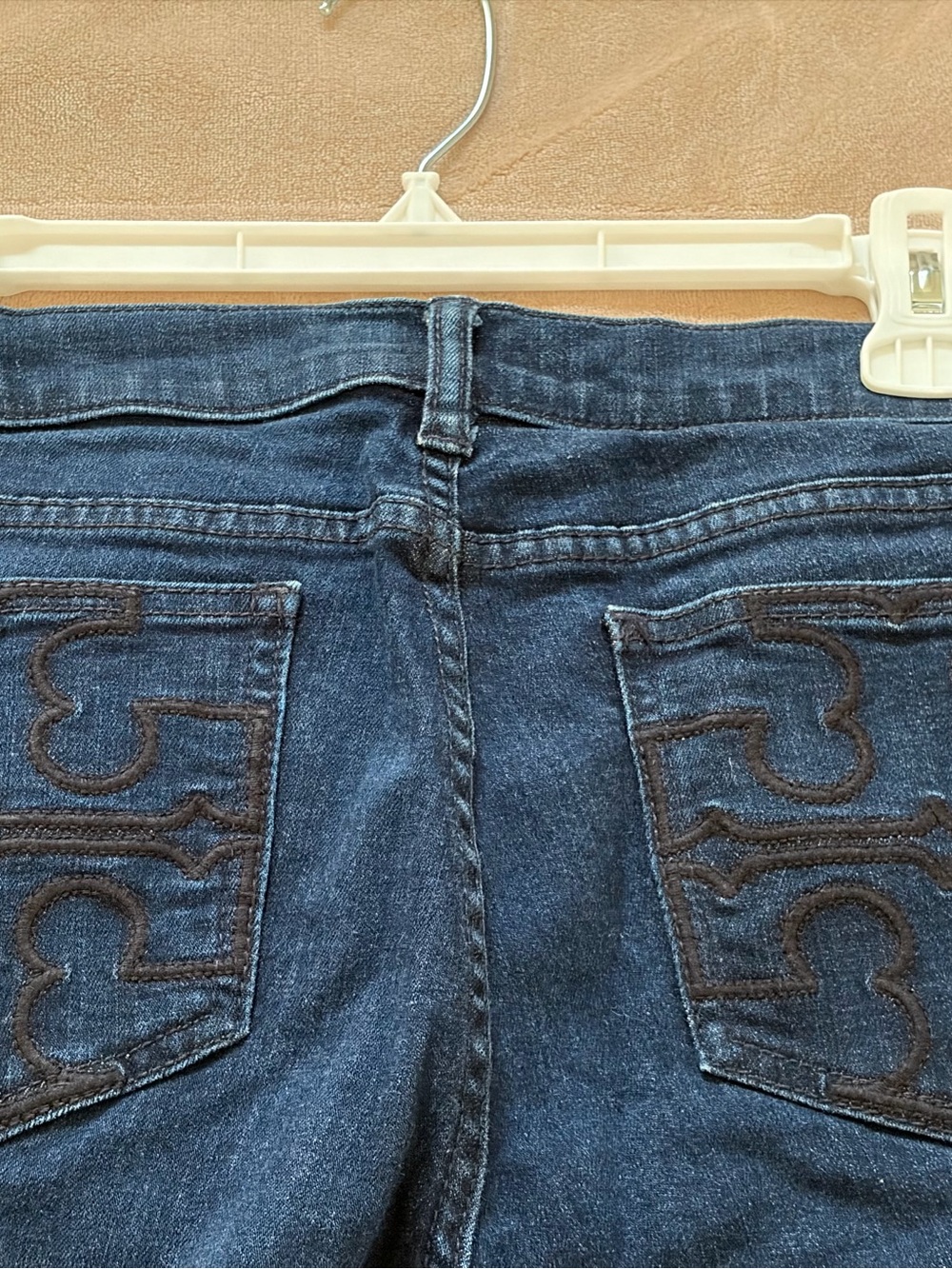 Tory Burch Dark Blue Boot Cut Jeans with Embroidered Back Pockets.